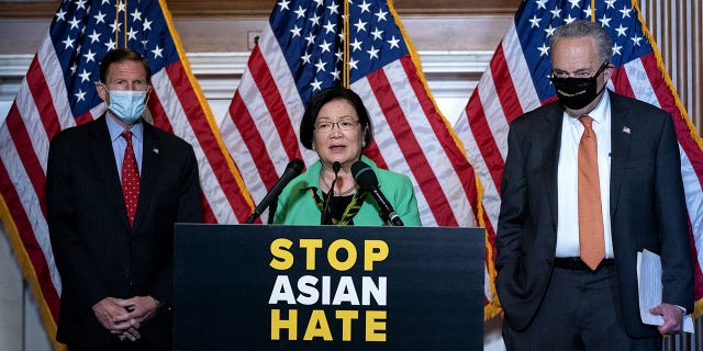 Sen. Mazie Hirono, a Democrat from Hawaii, center, speaks during a news conference at the U.S. Capitol in Washington, D.C., on Thursday, April 22, 2021. The Senate passed by an overwhelming margin legislation designed to combat hate crimes in the U.S., as lawmakers united to respond after a sharp increase in attacks against Asian Americans since the onset of the coronavirus pandemic. (Stefani Reynolds/Bloomberg via Getty Images)