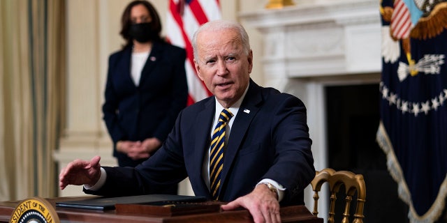 President Joe Biden signs an executive order on the economy at the White House on Feb. 24, 2021. (Doug Mills/Pool/Sipa USA)