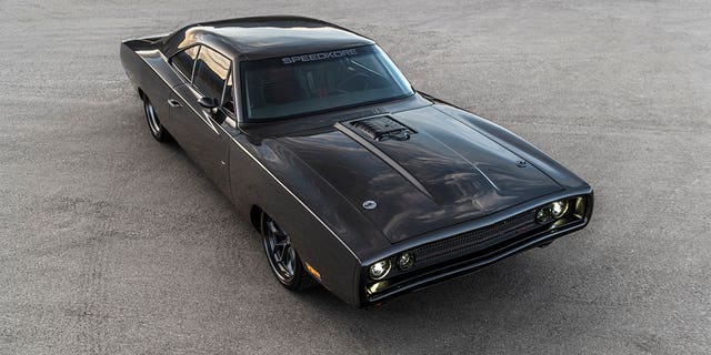 The SpeedKore Hellraiser is a custom 1970 Dodge Charger powered by a Hellephant crate engine.