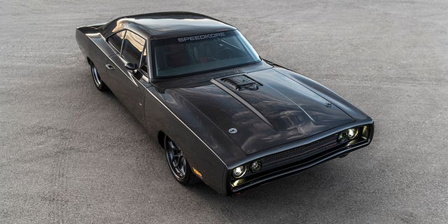 The SpeedKore Hellraiser is a custom 1970 Dodge Charger powered by a Hellephant crate engine.