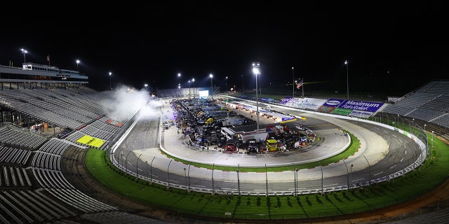 Smoke from Truex's celebratory burnout can be seen rising from the finish line at Martinsville Speedway last June.