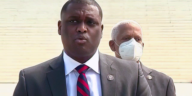 Rep. Mondaire Jones, D-N.Y., speaks before the Supreme Court on April 15, 2021, on his legislation to expand the Supreme Court.