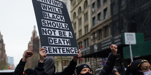 Protestors gather in Washington Square Park in New York April 12, 2021 during a protest after a suburban Minneapolis police officer fatally shot 20-year-old Daunte Wright during a traffic stop.(Photo by TIMOTHY A. CLARY / AFP) (Photo by TIMOTHY A. CLARY/AFP via Getty Images)