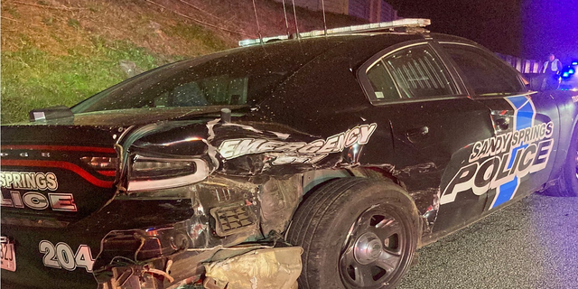 The damaged patrol car following the collision. (Sandy Springs Police Department)