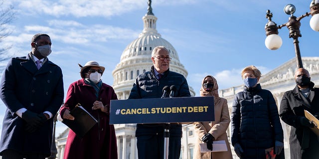Student loan debt forgiveness added approximately $400 billion to the national debt. FILE:  Senate Majority Leader Chuck Schumer (D-NY) speaks during a press conference about student debt outside the U.S. Capitol on February 4, 2021, in Washington, DC. 