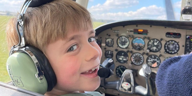 Pint-sized Jacob Newson, who dreams of becoming a RAF pilot, took his first flying lesson. (SWNS). 