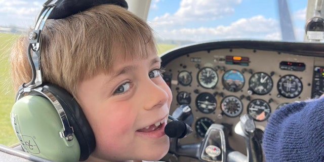 Pint-sized Jacob Newson, who dreams of becoming a RAF pilot, took his first flying lesson. (SWNS).