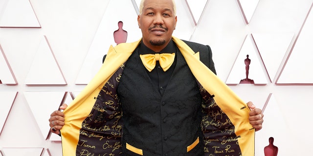 Travon Free attends the 93rd Annual Academy Awards on April 25. He wore a Dolce &amp; Gabbana suit lined with the names of those killed by police brutality in the United States. 