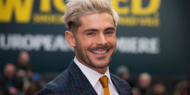 Actor Zac Efron poses for photographers upon arrival at the 'Extremely Wicked, Shockingly Evil And Vile' premiere in London in April 2019.