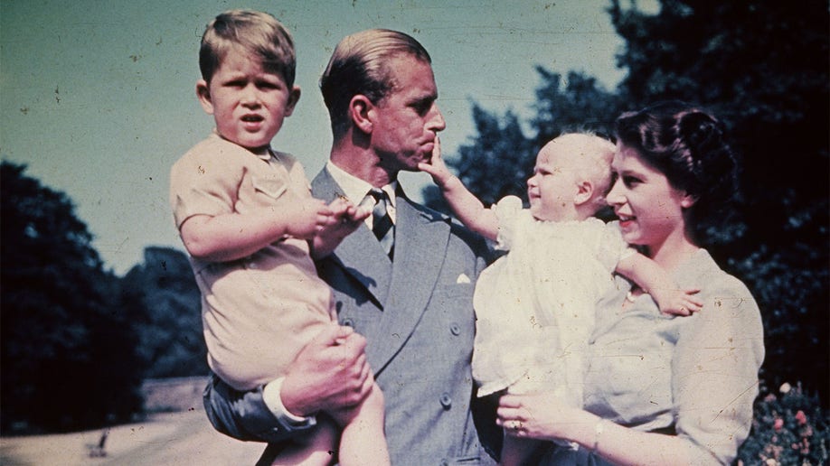 Queen Elizabeth and Prince Philip with their children Anne and Charles