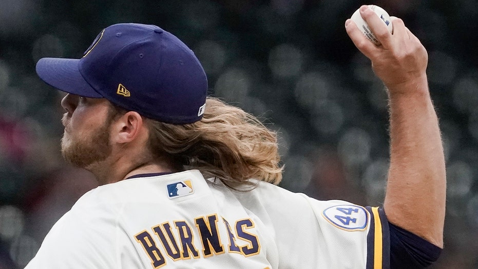 Burnes delivers with arm, bat as Brewers trounce Cubs 7-0