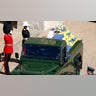 Members of the armed forces pay tribute to Prince Philip, Duke of Edinburgh, during the funeral procession Saturday to St. George's Chapel in Windsor Castle. Philip, who was married to Queen Elizabeth II for 73 years, died April 9 at the age of 99. (Photo by Adrian DENNIS / POOL / AFP) (Photo by ADRIAN DENNIS/POOL/AFP via Getty Images)