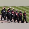 Soldiers walk through the entrance of Windsor Castle ahead of the funeral of Britain's Prince Philip in Windsor, England, on Saturday, April 17, 2021. Prince Philip died April 9 at the age of 99 after 73 years of marriage to Queen Elizabeth II. (Hannah McKay/Pool via AP)