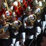 Soldiers arrive at Windsor Castle ahead of the funeral of Britain's Prince Philip in Windsor, England, Saturday, April 17, 2021. Prince Philip died April 9 at the age of 99 after 73 years of marriage to Britain's Queen Elizabeth II. (Hannah McKay/Pool via AP)