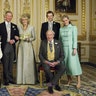 (EMBARGOED TO 0001 BST MONDAY APRIL 11 2005) WINDSOR, ENGLAND - APRIL 9: Clarence House official handout photo of the Prince of Wales and his new bride Camilla, Duchess of Cornwall, with their families (L-R back row) Prince Harry, Prince William, Tom and Laura Parker Bowles (L-R front row) Duke of Edinburgh, Britain's Queen Elizabeth II and Camilla's father Major Bruce Shand, in the White Drawing Room at Windsor Castle after their wedding ceremony, April 9, 2005 in Windsor, England. (Photo by Hugo Burnand/Pool/Getty Images)