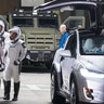 In this photo provided by NASA, NASA astronauts Shane Kimbrough, front, Japan Aerospace Exploration Agency (JAXA) astronaut Akihiko Hoshide, right, and ESA (European Space Agency) astronaut Thomas Pesquet, back, wearing SpaceX spacesuits, prepare to depart the Neil A. Armstrong Operations and Checkout Building for Launch Complex 39A to board the SpaceX Crew Dragon spacecraft for the Crew-2 mission launch, Friday, April 23, 2021, at the Kennedy Space Center in Cape Canaveral, Fla. (Aubrey Gemignani/NASA via AP)