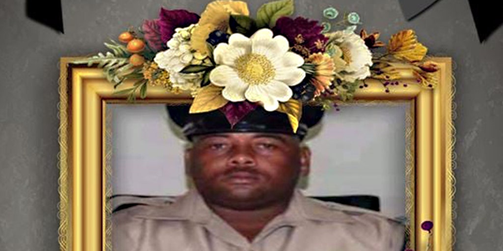 Slain Belize police chief's family pursues lawsuit,
socialite suspect released on bail