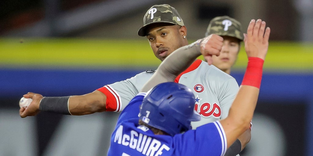 Jean Segura restrained from Joe Girardi in Phillies dugout incident