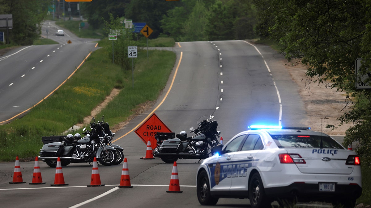 Dolley Madison Boulevard is blocked off by law enforcement in response to a security-related situation outside of the secure perimeter near the main gate of CIA headquarters in Virginia, U.S. May 3, 2021. REUTERS/Leah Millis