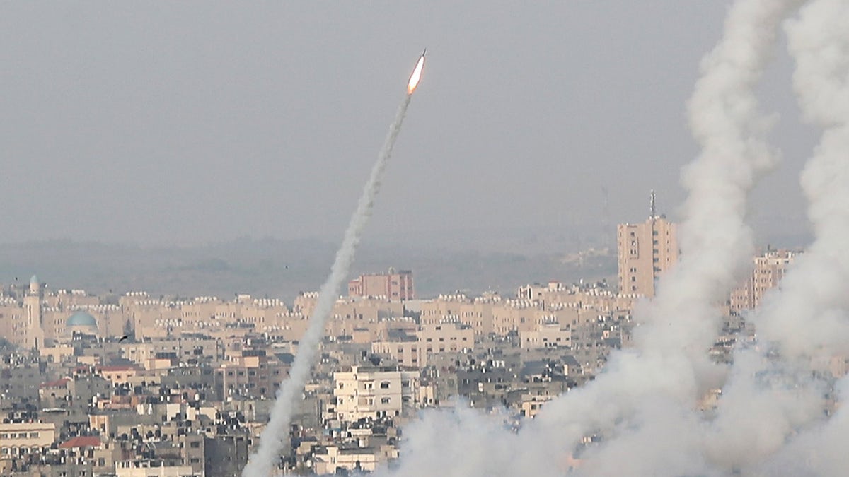 Rockets are launched by Palestinian militants into Israel, in Gaza May 10, 2021. REUTERS/Mohammed Salem