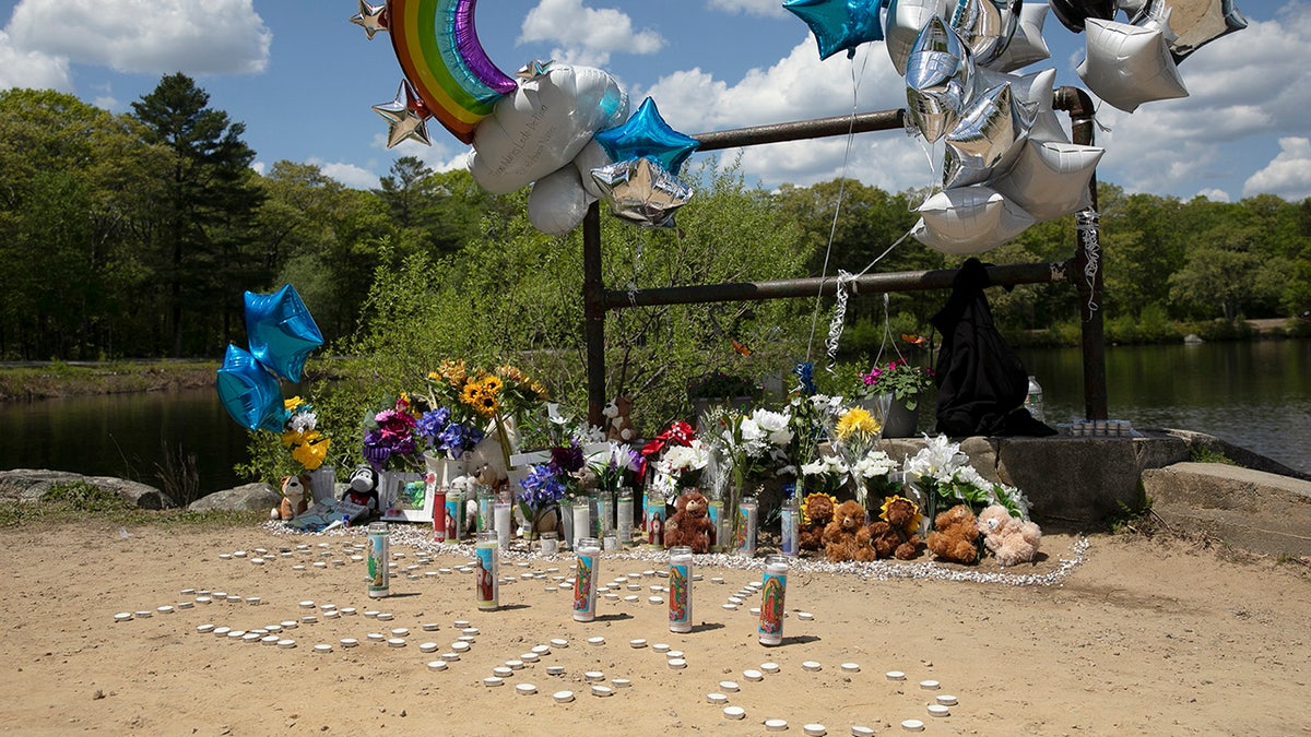 A memorial at Waldo Lake in D.W. Field Park on Monday, May 17, 2021 has grown since Sunday in memory of two Brockton boys who drowned Saturday night. (Alyssa Stone-USA TODAY NETWORK)