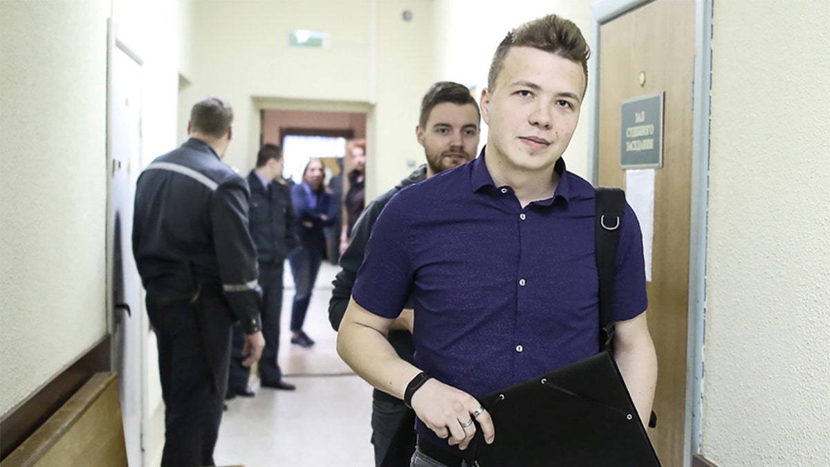 Opposition blogger and activist Roman Protasevich, who is accused of participating in an unsanctioned protest at the Kuropaty preserve, arrives for a court hearing in Minsk, Belarus April 10, 2017. 