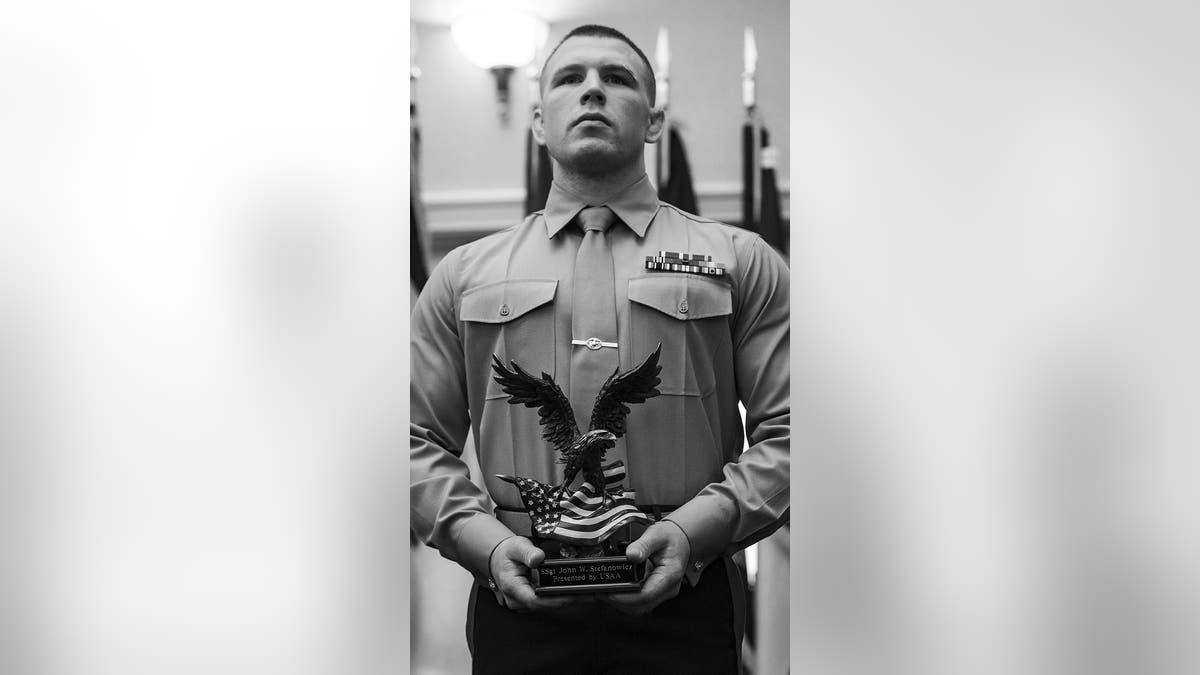 U.S. Marine Staff Sgt. John W. Stefanowicz, with Marine Corps Base Camp Lejeune, N.C., is awarded and recognized as the Athlete of the Year for the United States Marine Corps Wrestling Team at the Commandant of the Marine Corps Combined Awards Ceremony at The Clubs at Quantico, Marine Corps Base Quantico, Va., Jan. 22, 2020. This ceremony originated in 1995 recognizing top recruiters, instructors, and the command with the highest combined physical and combat fitness performance. (U.S. Marine Corps by photo Cpl. Mikayla R. Perez)