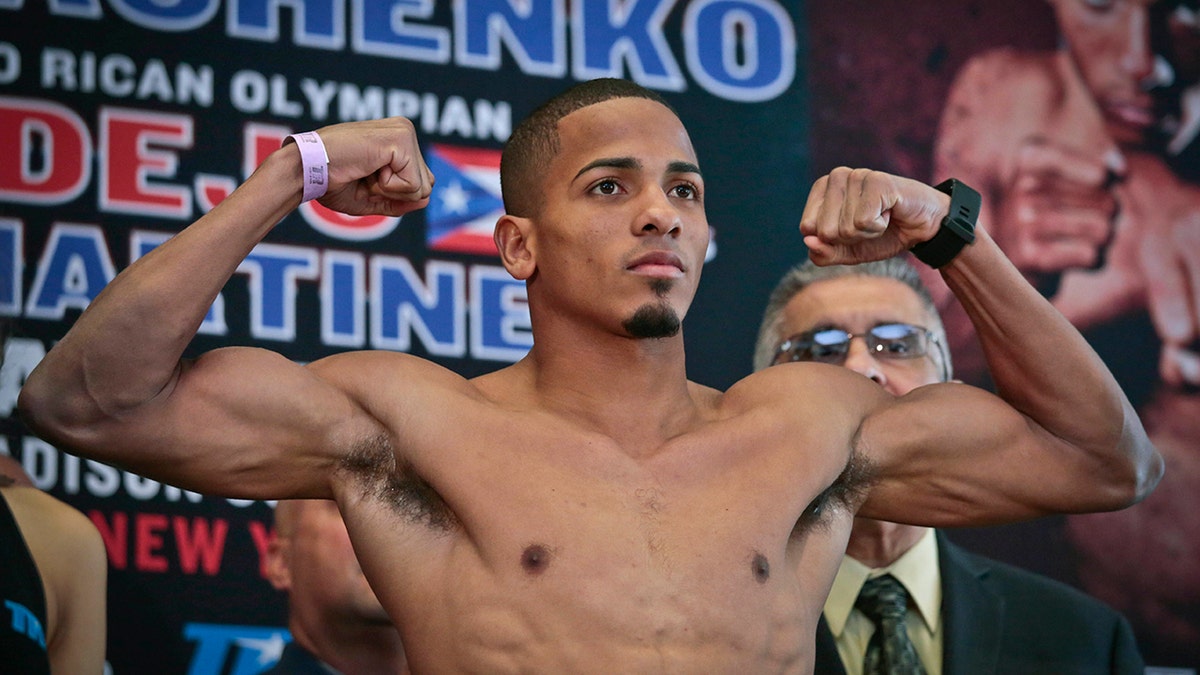 FILE - Puerto Rican boxer Felix Verdejo poses after his weigh-in at Madison Square Garden in New York, in this Friday, June 10, 2016, file photo.  (AP Photo/Bebeto Matthews, File)