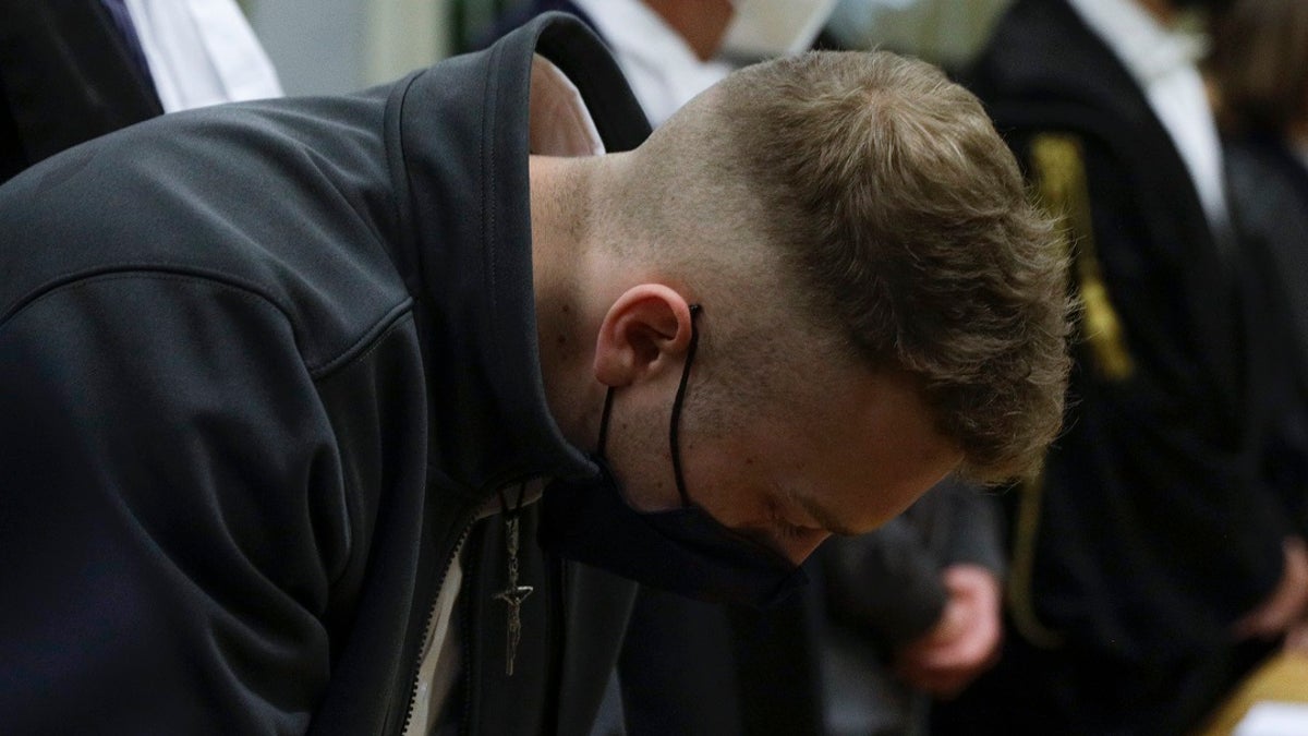 Finnegan Lee Elder listens to the verdict in the trial for the slaying of an Italian plainclothes police officer on a street near the hotel where he and his co-defendant Gabriel Natale-Hjorth were staying while on vacation in Rome in the summer of 2019. (AP Photo/Gregorio Borgia)