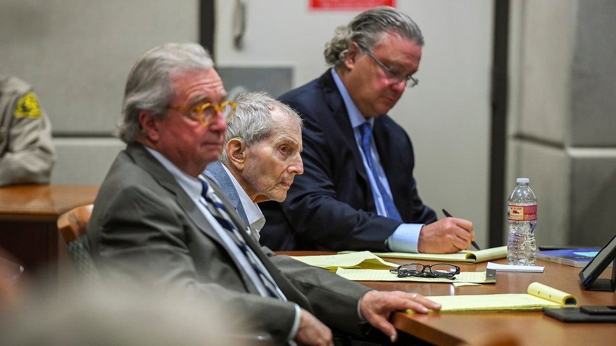 In this March 5, 2020, file photo real estate heir Robert Durst, middle, sits with his defense attorneys, David Chesnoff, left, and Dick DeGuerin during his murder trial at the Airport Branch Courthouse in Los Angeles. (Robyn Beck/Pool Photo via AP, File)