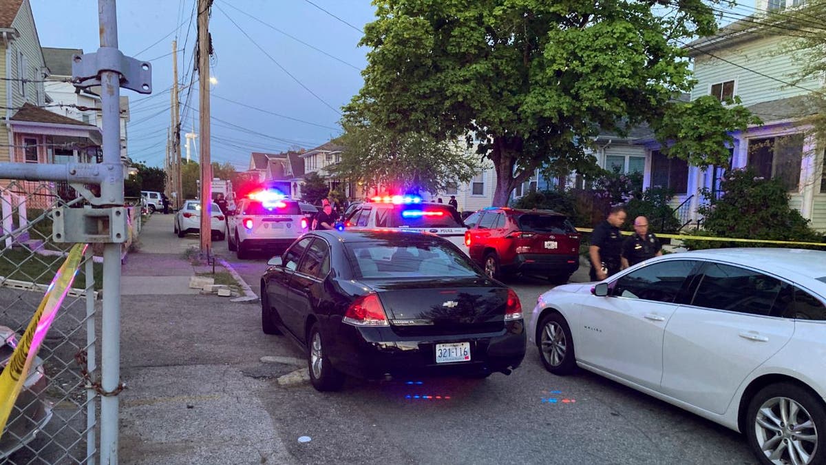 Authorities respond to the scene where multiple people were wounded in a shooting, Thursday, May 13, 2021, in Providence, R.I. (AP Photo/William J. Kole)