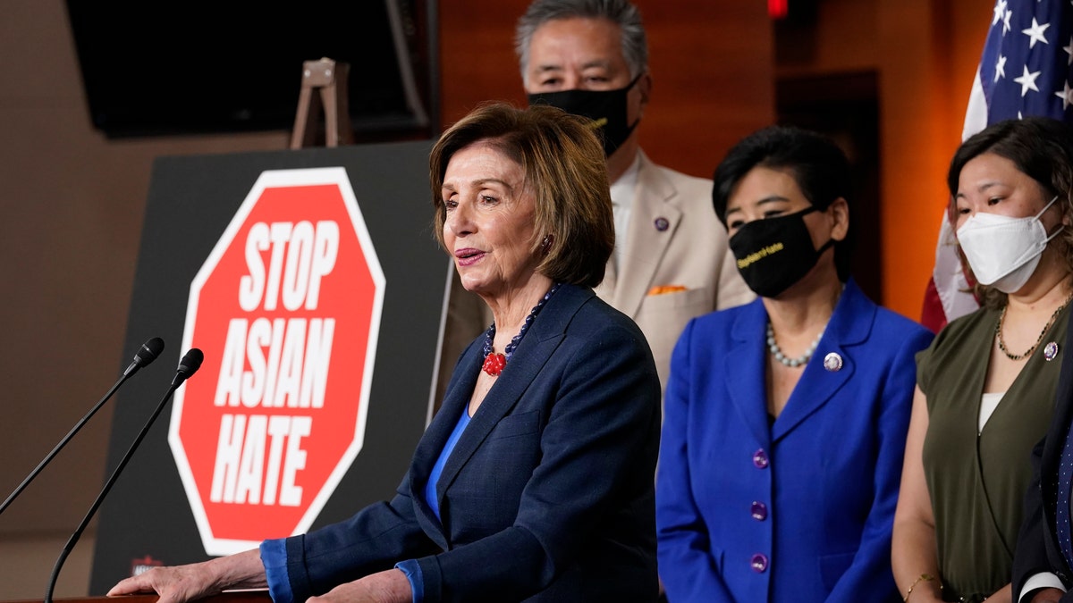 House Speaker Nancy Pelosi of Calif., left, speaks during a news conference on Capitol Hill in Washington, Tuesday, May 18, 2021, on the COVID-19 Hate Crimes Act. Pelosi is joined by Rep. Mark Takano, D-Calif., second from left, Rep. Judy Chu, D-Calif., second from right and Rep. Grace Meng, D-N.Y. (AP Photo/Susan Walsh)