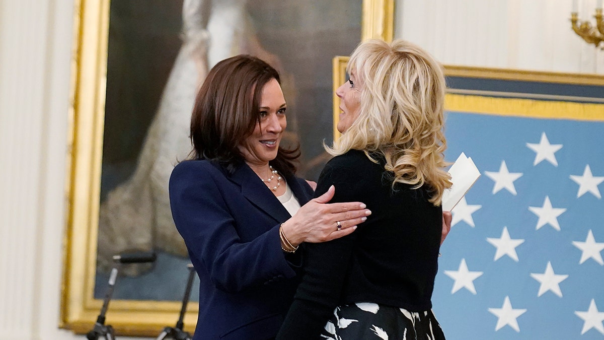 First lady Jill Biden is greeted by Vice President Kamala Harris before a Medal of Honor ceremony for retired U.S. Army Col. Ralph Puckett, in the East Room of the White House, Friday, May 21, 2021, in Washington. (Associated Press)