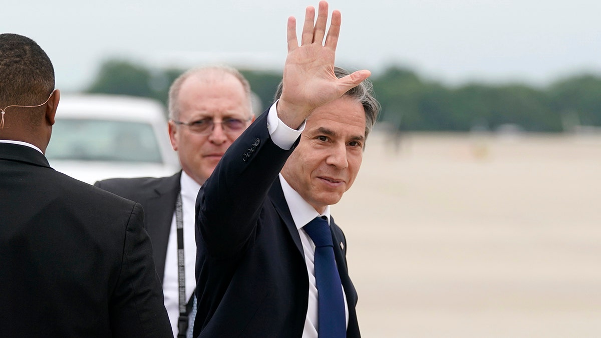 Secretary of State Antony Blinken waves as he departs, Monday, May 24, 2021, at Andrews Air Force Base, Md. Blinken said Tuesday that the United States will continue its effort to rejoin the Iran nuclear deal over Israeli objections. (AP Photo/Alex Brandon, Pool)