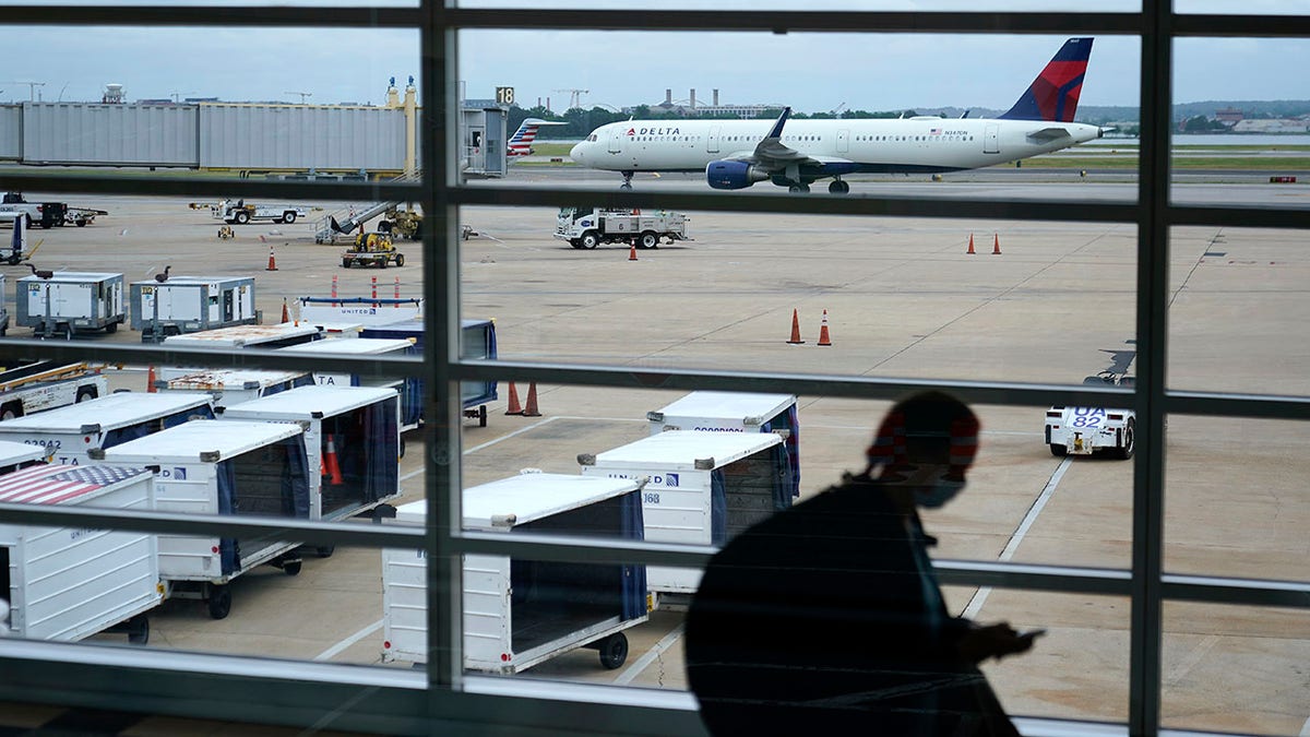 A Delta Air Lines aircraft taxies away from a gate