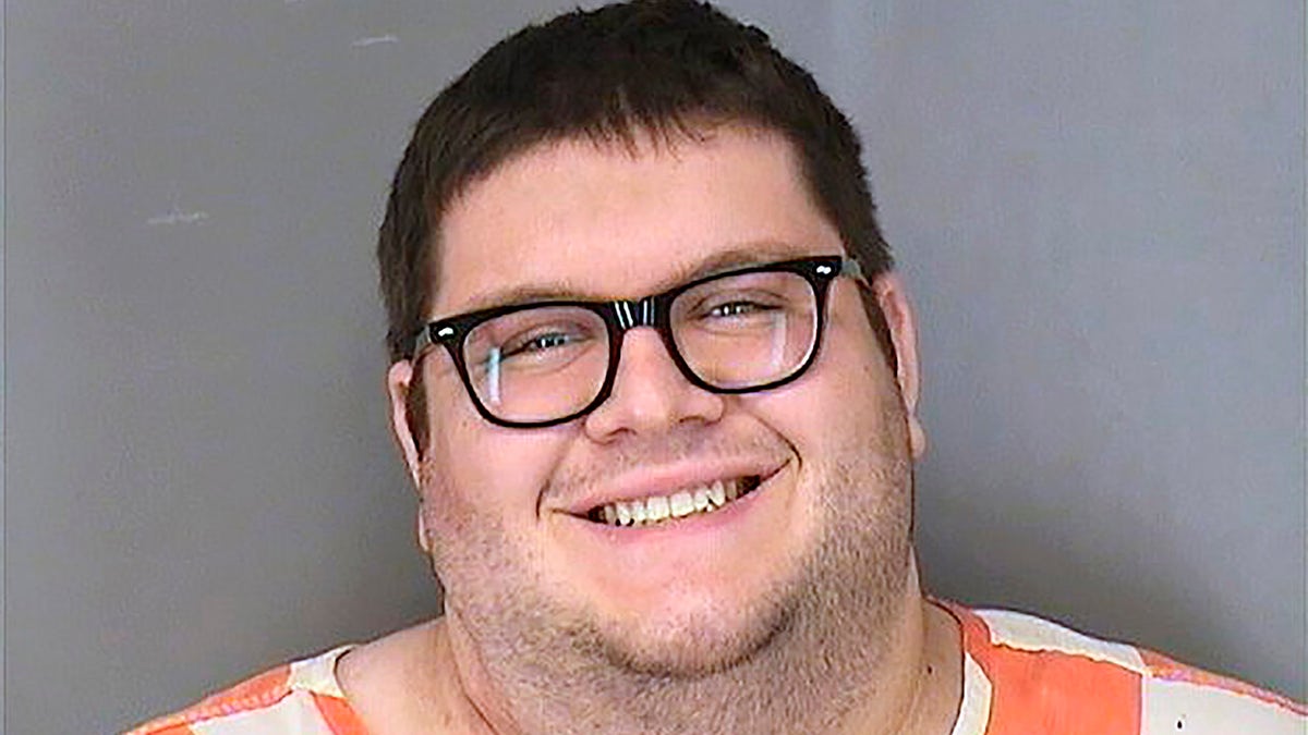 Roberto Silva Jr. is accused of killing two workers and wounding two others during a shooting at a Nebraska fast-food restaurant last fall, and now has been charged with stabbing a fellow jail inmate. (Sarpy County Jail via AP)