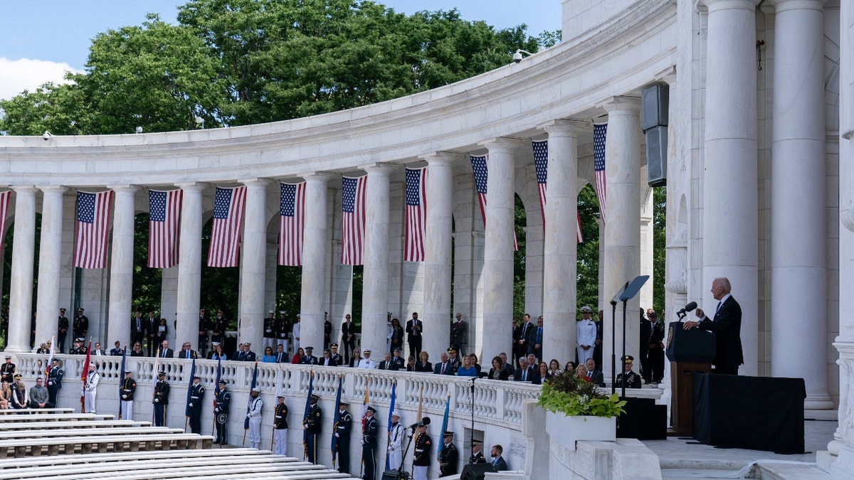 President Joe Biden speaks during the National Memorial Day Observance at the Memorial Amphitheater in Arlington National Cemetery, Monday, May 31, 2021, in Arlington, Va. (AP Photo/Alex Brandon)
