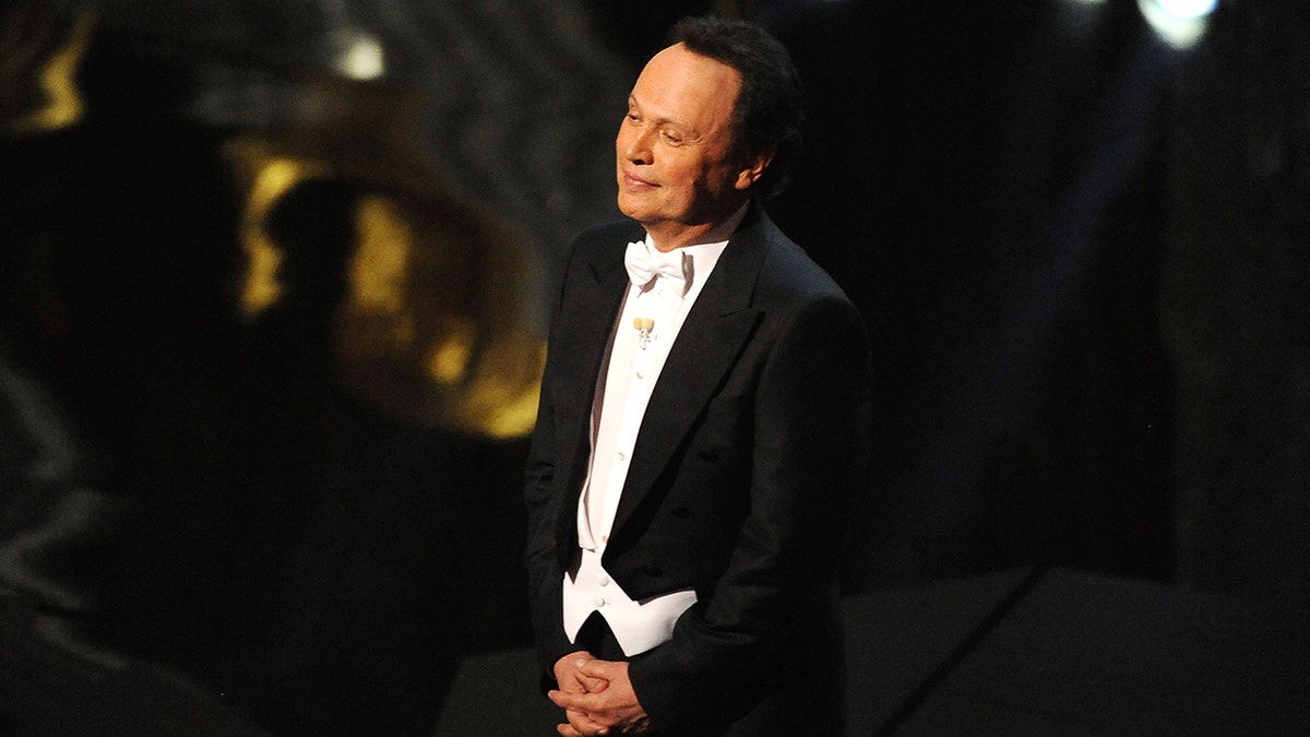 Host Billy Crystal speaks onstage during the 84th Annual Academy Awards held at the Hollywood & Highland Center on February 26, 2012 in Hollywood, California.