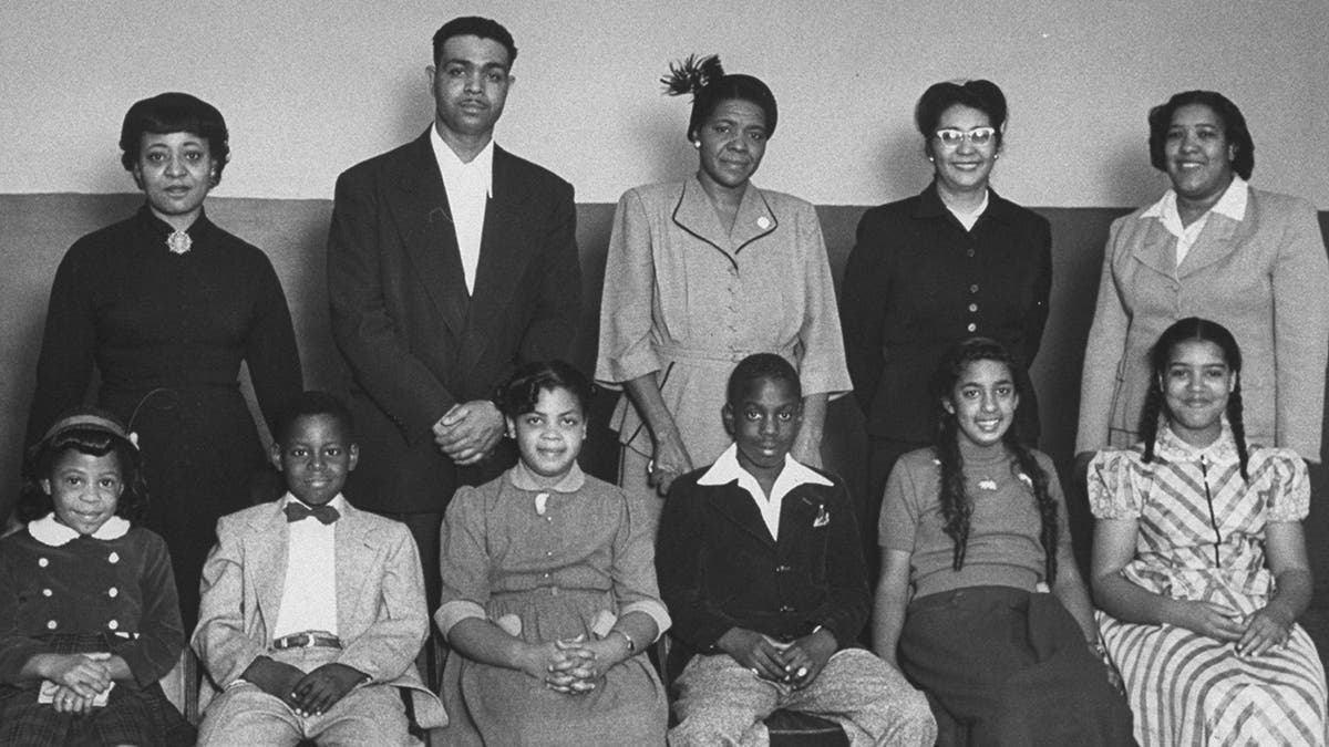 Portrait of the African-American students for whom the famous Brown vs Board of Education case was brought and their parents: (front row L-R) Vicki Henderson, Donald Henderson, Linda Brown, James Emanuel, Nancy Todd, and Katherine Carper; (back row L-R) Zelma Henderson, Oliver Brown, Sadie Emanuel, Lucinda Todd, &amp;amp; Lena Carper, Topeka, Kansas, 1953. (Photo by Carl Iwasaki/The LIFE Images Collection via Getty Images/Getty Images)