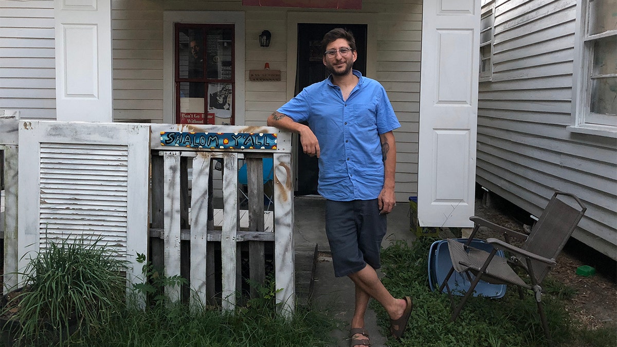 Journalist Danny Fenster, 37, is pictured in June 2018 outside his house in Lafayette, LA.