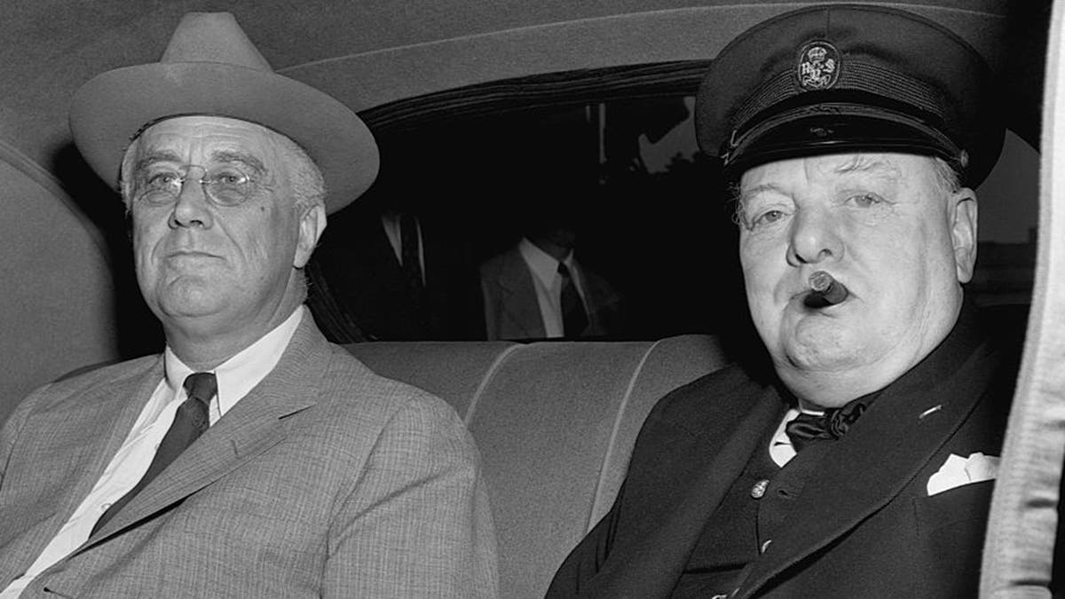 Prime Minister Churchill arrives at the White House with President Roosevelt.