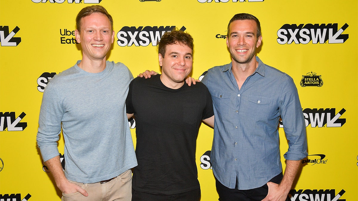 AUSTIN, TEXAS - MARCH 09: Tommy Vietor, Jon Lovett, and Jon Favreau attend the "Running with Beto" Premiere 2019 SXSW Conference and Festivals at Paramount Theatre on March 09, 2019 in Austin, Texas. (Photo by Matt Winkelmeyer/Getty Images for SXSW)