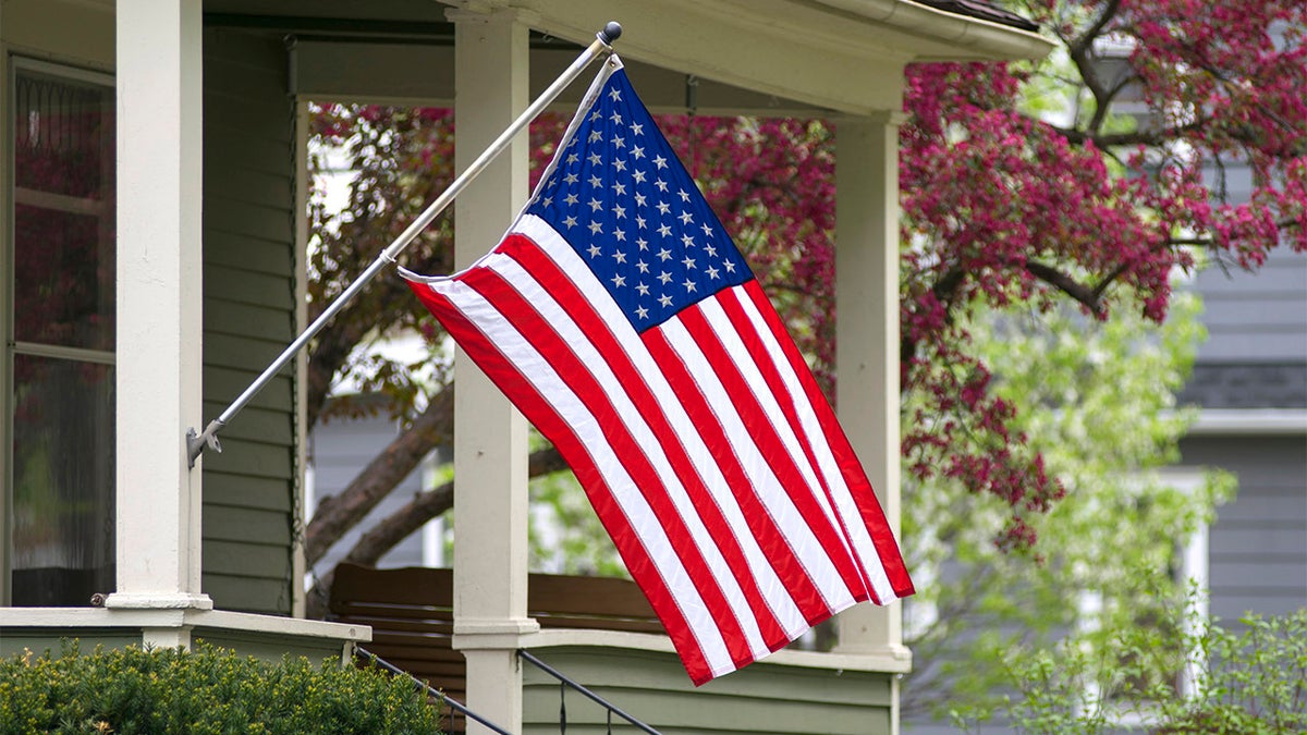 American flag displayed on porch