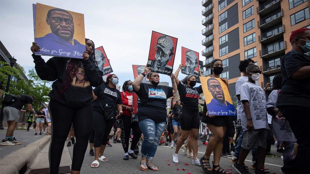 The family of Daunte Wright march for the one year anniversary of George Floyd's death on Sunday, May 23, 2021, in Minneapolis, Minn.