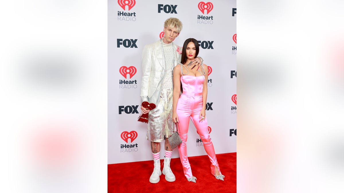 Machine Gun Kelly, winner of the Alternative Rock Album of the Year award for 'Tickets To My Downfall,’ and Megan Fox make it a date night. (Photo by Emma McIntyre/Getty Images for iHeartMedia)