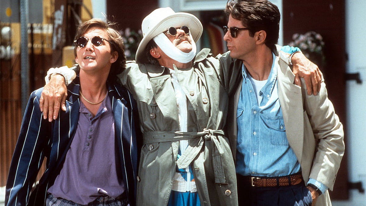 Andrew McCarthy, Terry Kiser and Jonathan Silverman hang out in a scene from the film 'Weekend At Bernie's II', 1993.?