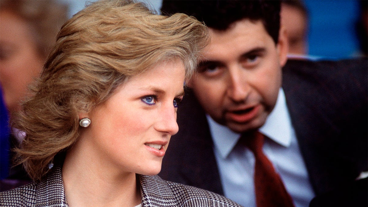 A close-up of Patrick Jephson talking to Princess Diana
