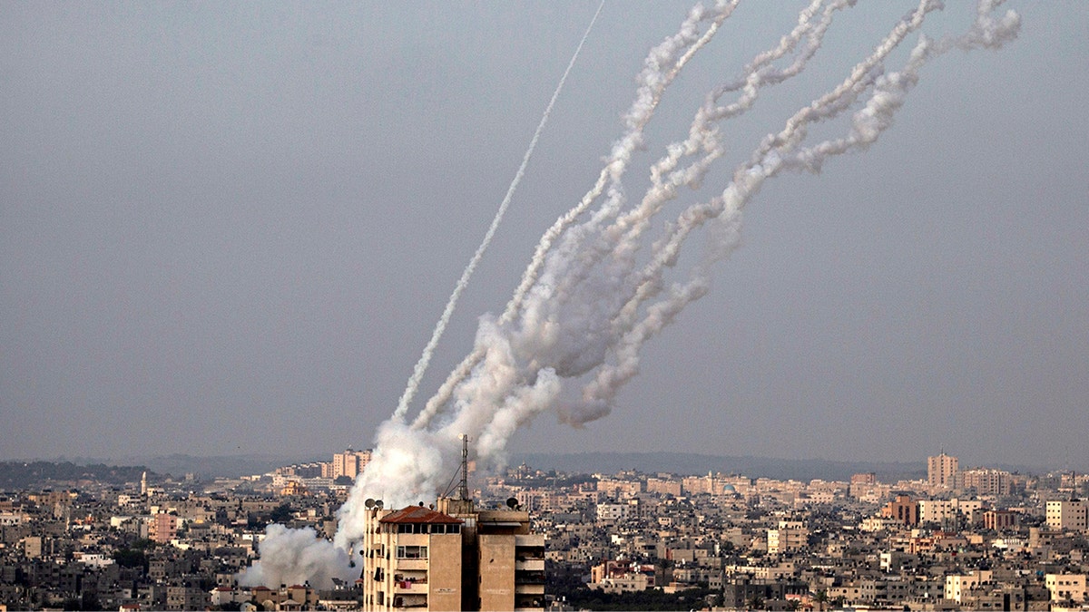 Rockets are launched from the Gaza Strip towards Israel, Monday, May. 10, 2021. (AP Photo/Khalil Hamra)