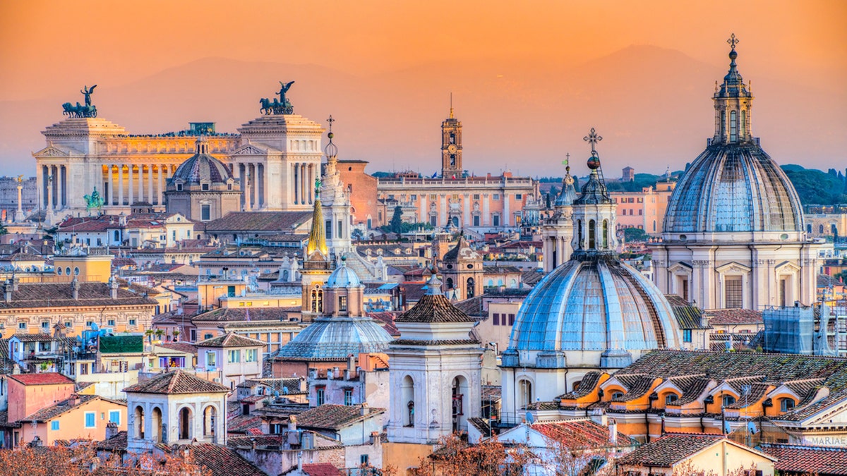 Skyline of Rome Italy while sun is setting 