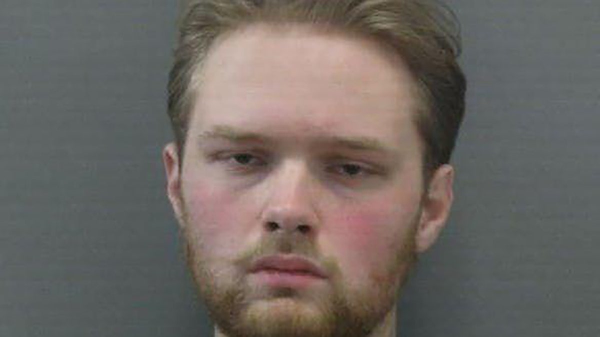 Joseph Thomas Ness, 21, was taken into custody without incident.